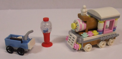 Süßigkeitenautomat, Wägelchen für den Abtransport und Candy-Express.